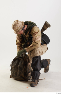 Photos Reece Bates Army Seal Team Poses kneeling whole body…